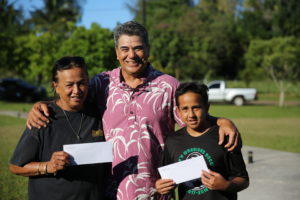 Photo: Dan Ahuna with aid recipients
