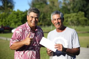 Photo: Dan Ahuna with an aid recipient